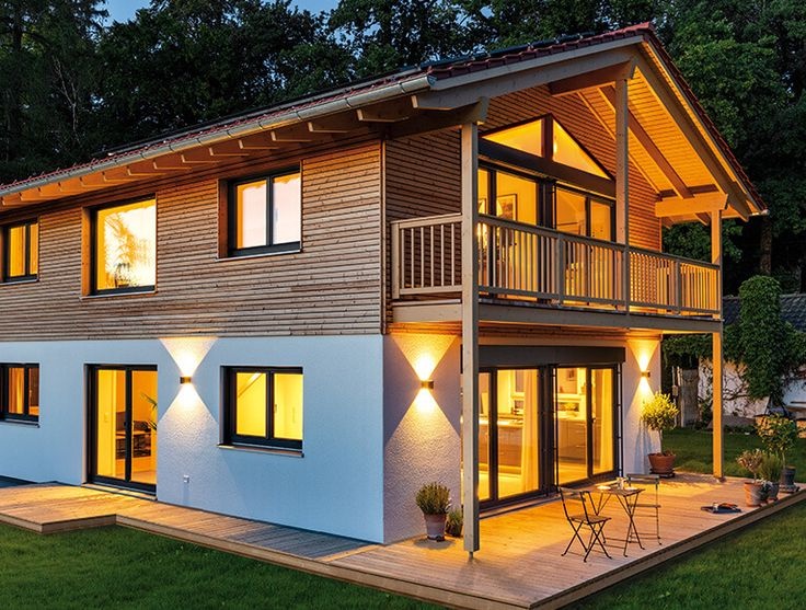 Häuserbau mit Balkon Keller Carbort Holzbau Bauunternehmen