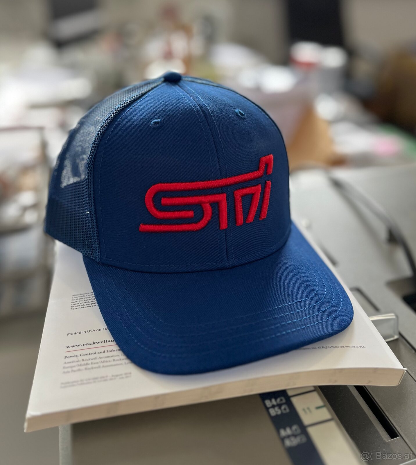 I am selling a blue Subaru STi cap with 3D logo