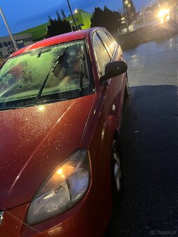 Kia rio - 4